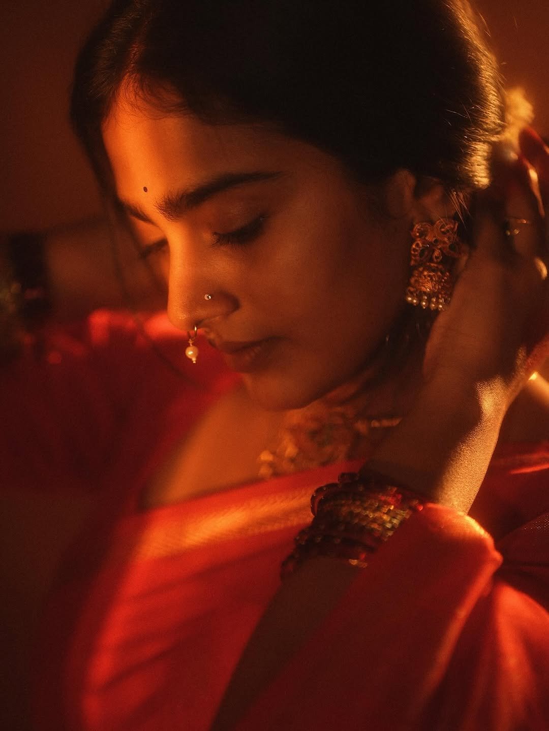 Yoga Lakshmi Golden Hour Close-Up – Traditional Nose Ring & Red Saree Glow (4)