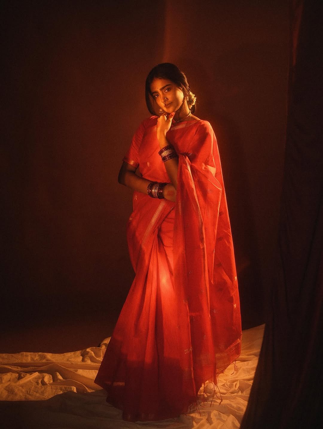 Yoga Lakshmi Golden Hour Close-Up – Traditional Nose Ring & Red Saree Glow (5)