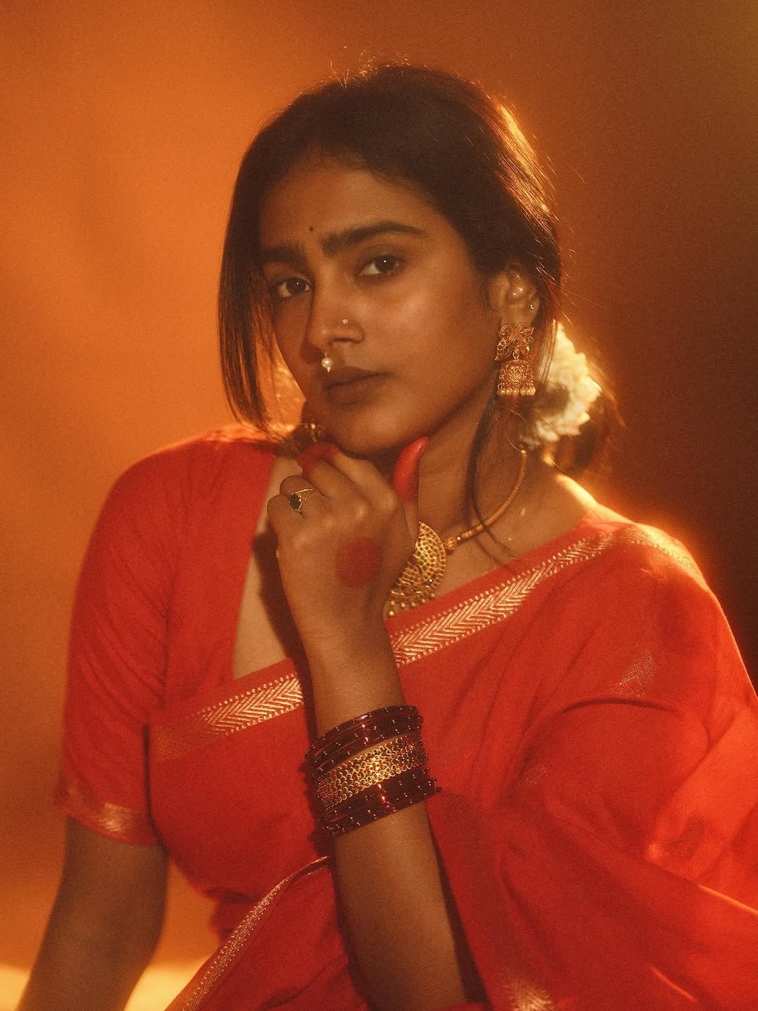 Yoga Lakshmi Golden Hour Close-Up – Traditional Nose Ring & Red Saree Glow (7)