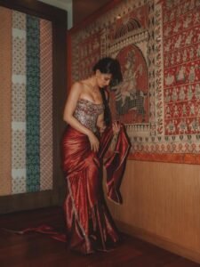 Disha Patani Stuns in Royal Red Saree with Golden Corset trending celebrity photos