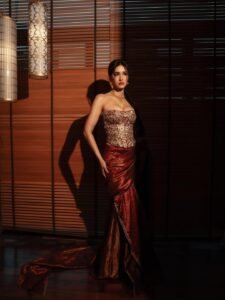 Disha Patani Stuns in Royal Red Saree with Golden Corset beautiful outfit images