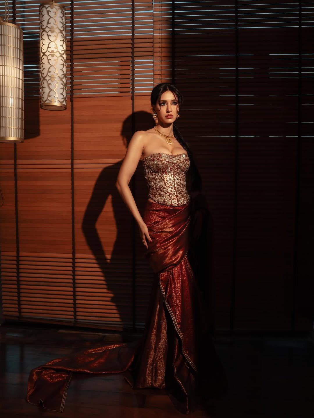 Disha Patani Stuns in Royal Red Saree with Golden Corset (10)