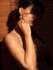 Disha Patani Stuns in Royal Red Saree with Golden Corset stunning fashion look