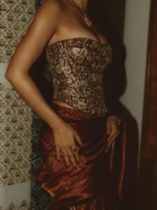 Disha Patani Stuns in Royal Red Saree with Golden Corset beautiful outfit images