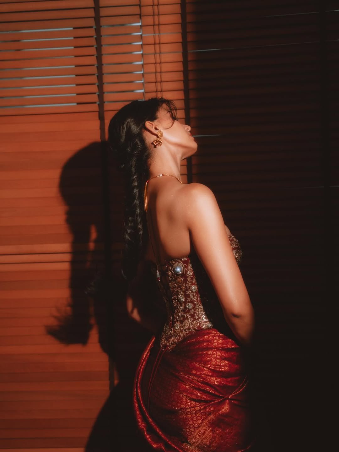 Disha Patani Stuns in Royal Red Saree with Golden Corset (6)