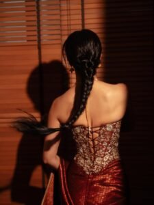 Disha Patani Stuns in Royal Red Saree with Golden Corset stunning fashion look