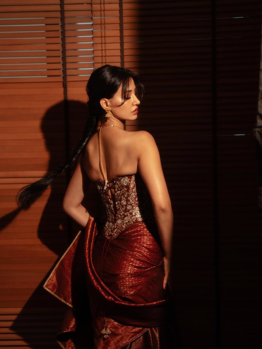 Disha Patani Stuns in Royal Red Saree with Golden Corset (8)