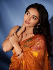 Kayadu Lohar Stunning Orange Saree Traditional Look HD Images trending celebrity photos
