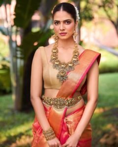 Malavika Mohanan Stunning in Red Silk Saree with Temple Jewelry latest HD photos