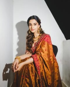 Meenakshi Chaudhary Stunning Red Saree Photos 2026 latest HD photos