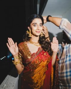 Meenakshi Chaudhary Stunning Red Saree Photos 2026 latest HD photos