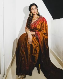 Meenakshi Chaudhary Stunning Red Saree Photos 2026 trending celebrity photos