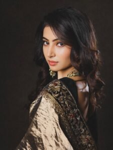 Sara Arjun Looks Stunning in Elegant Black and Gold Saree stunning fashion look