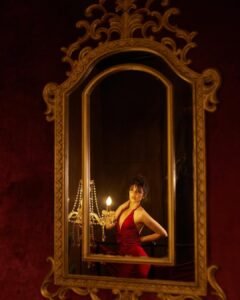 Sara Arjun Stunning Red Gown Photoshoot in Dark Room stunning fashion look