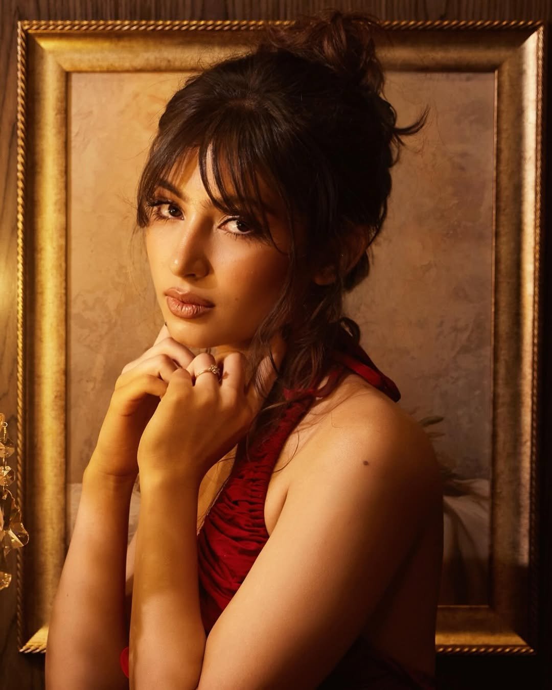 Sara Arjun Stunning Red Gown Photoshoot in Dark Room trending celebrity photos