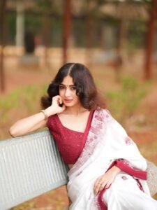 Yashu Looks Elegant in White Saree with Maroon Blouse stunning fashion look