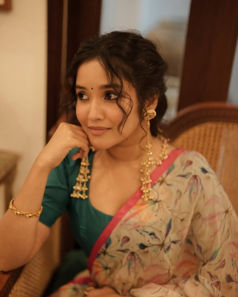 Anikha Surendran Looks Graceful in Floral Saree and Teal Blouse Photos (11)