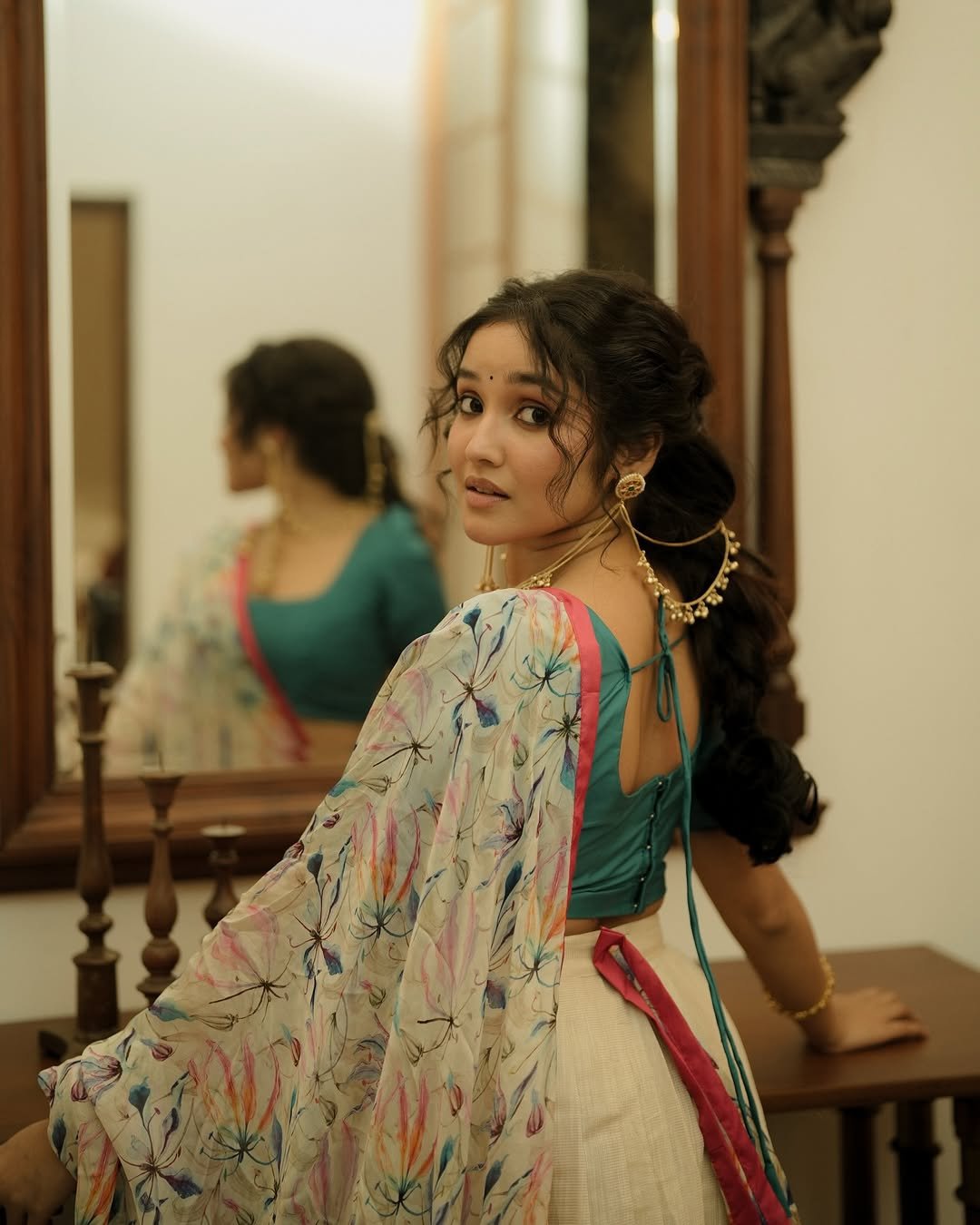 Anikha Surendran Looks Graceful in Floral Saree and Teal Blouse Photos (13)