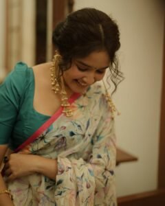 Anikha Surendran Looks Graceful in Floral Saree and Teal Blouse Photos (14)