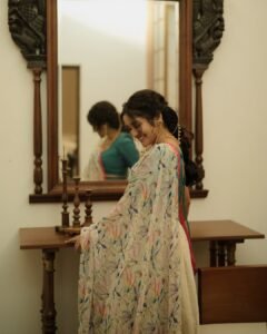 Anikha Surendran Looks Graceful in Floral Saree and Teal Blouse Photos (2)