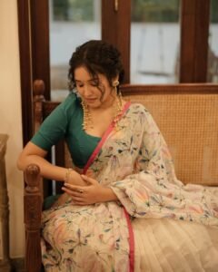 Anikha Surendran Looks Graceful in Floral Saree and Teal Blouse Photos (3)