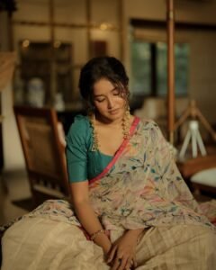 Anikha Surendran Looks Graceful in Floral Saree and Teal Blouse Photos (4)