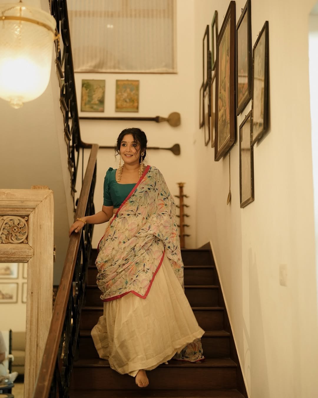 Anikha Surendran Looks Graceful in Floral Saree and Teal Blouse Photos (6)
