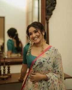 Anikha Surendran Looks Graceful in Floral Saree and Teal Blouse Photos (9)
