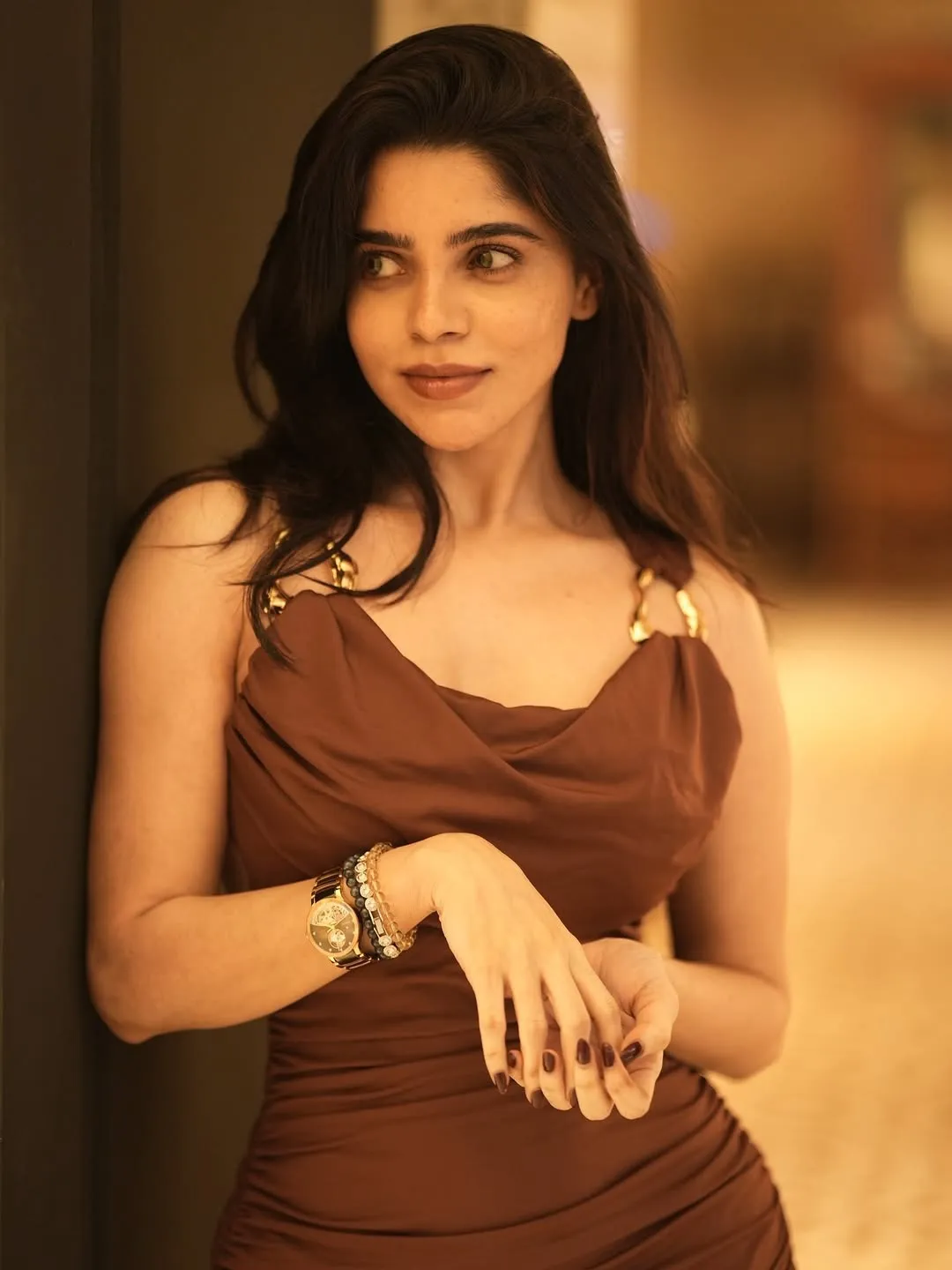 Divya Bharathi Looks Stunning in Chic Brown Bodycon Dress Photos (10)
