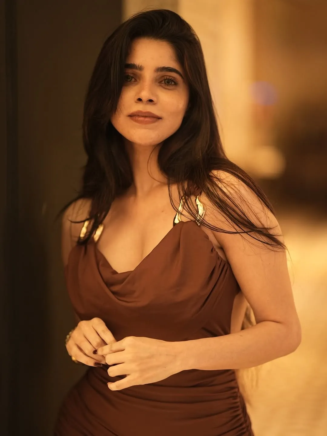 Divya Bharathi Looks Stunning in Chic Brown Bodycon Dress Photos (2)