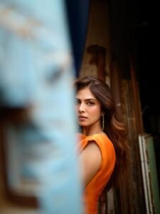 Malavika Mohanan Turns Heads in Stunning Orange Bodycon Dress Photos (13)
