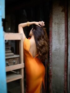 Malavika Mohanan Turns Heads in Stunning Orange Bodycon Dress Photos (4)