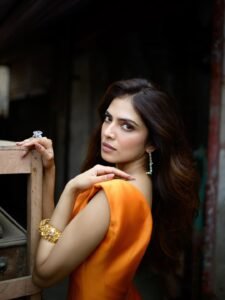 Malavika Mohanan Turns Heads in Stunning Orange Bodycon Dress Photos (6)