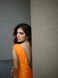 Malavika Mohanan Turns Heads in Stunning Orange Bodycon Dress Photos (8)