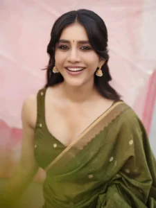 Nabha Natesh Radiates Charm in Elegant Green Saree Photos (1)