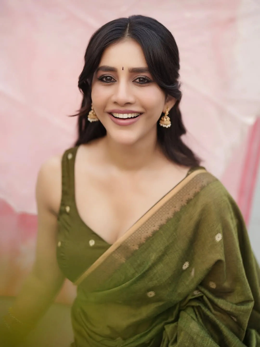 Nabha Natesh Radiates Charm in Elegant Green Saree Photos (1)