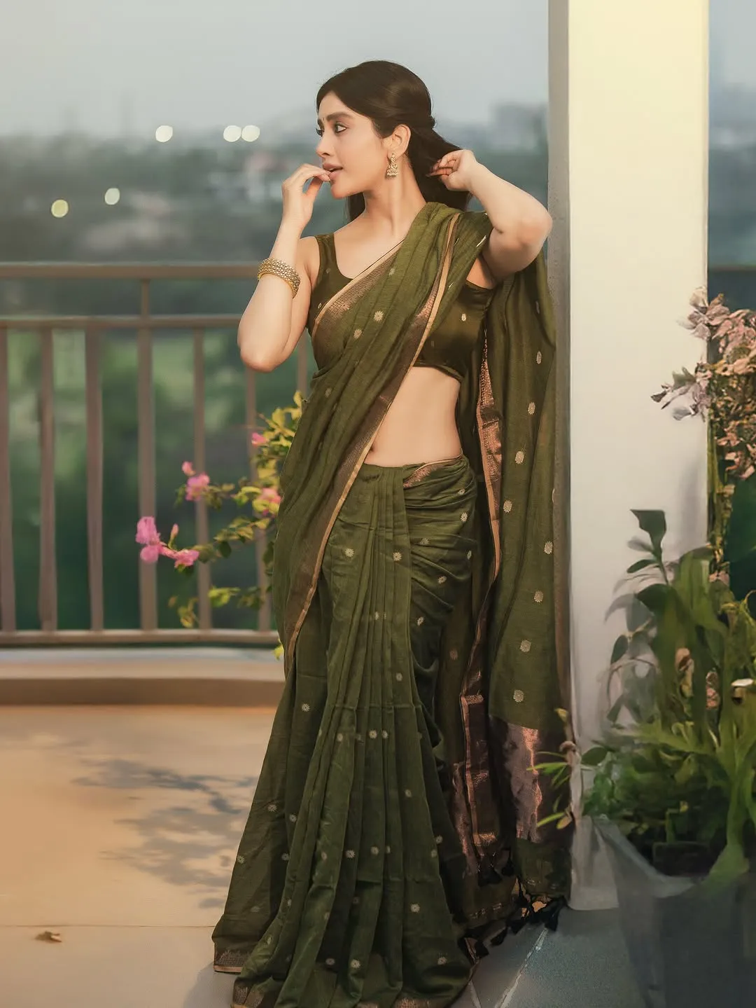 Nabha Natesh Radiates Charm in Elegant Green Saree Photos (14)