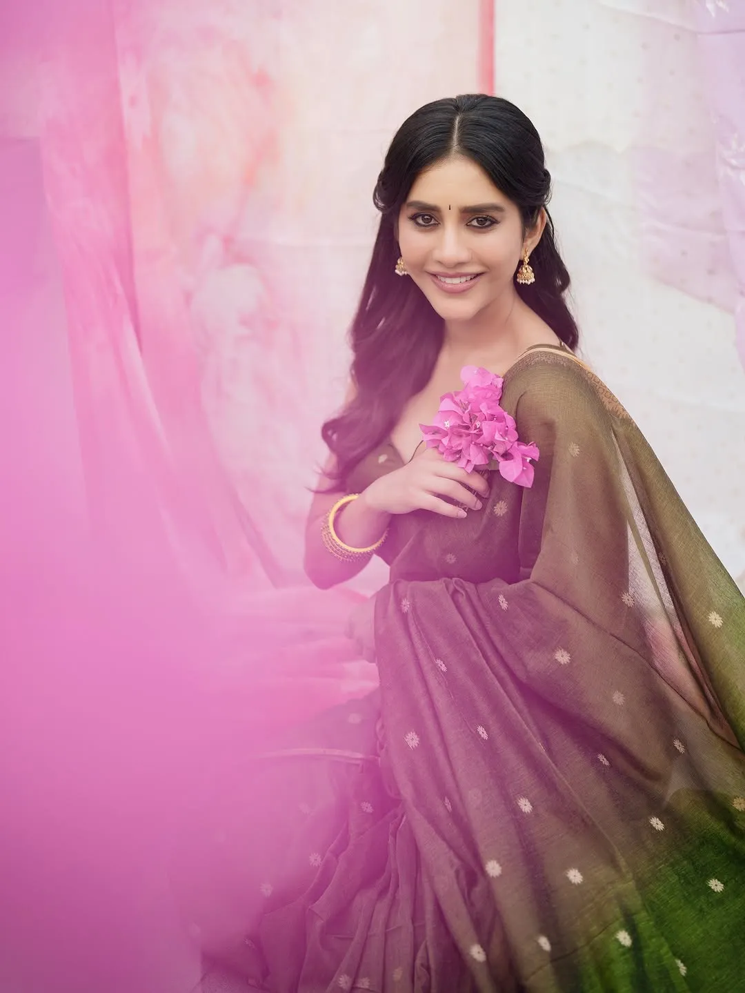 Nabha Natesh Radiates Charm in Elegant Green Saree Photos (3)