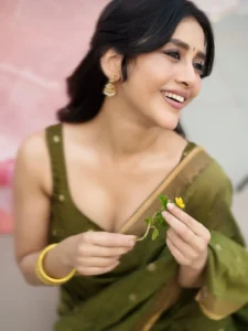 Nabha Natesh Radiates Charm in Elegant Green Saree Photos (7)