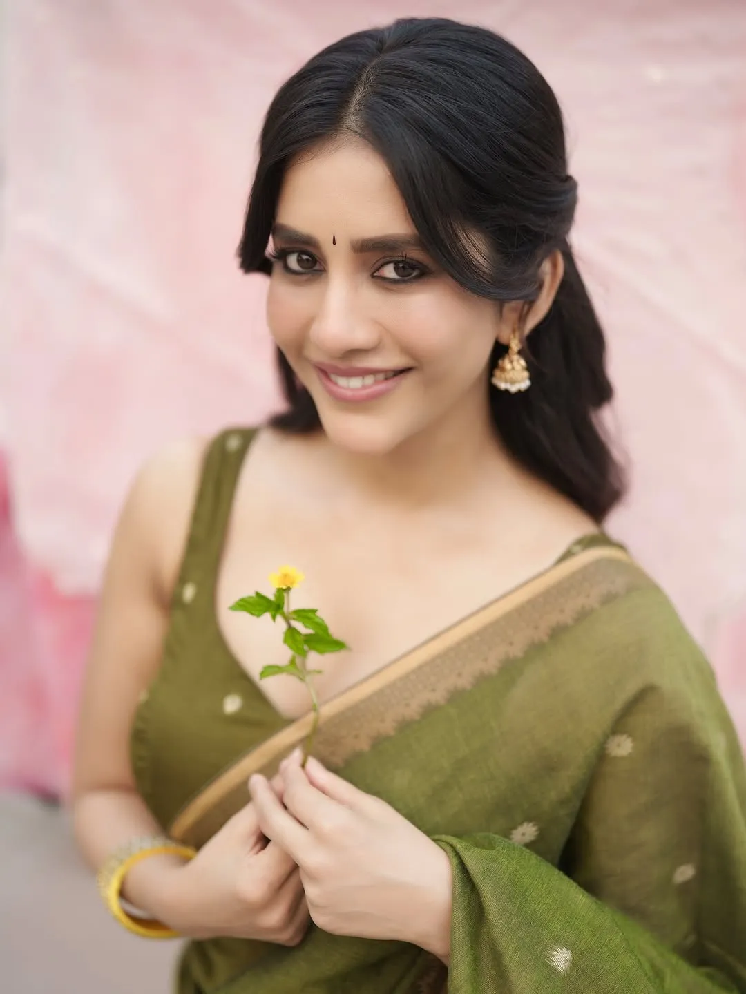 Nabha Natesh Radiates Charm in Elegant Green Saree Photos (9)