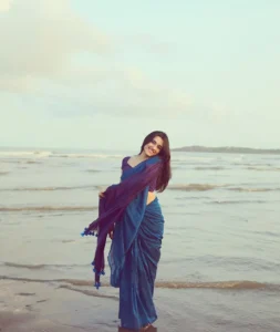 Nuveksha Looks Charming in Elegant Blue Saree Beach Photos (11)