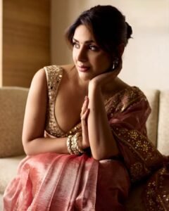 Samyuktha Looks Radiant in Maroon Saree and Mirror Work Blouse Photos (8)
